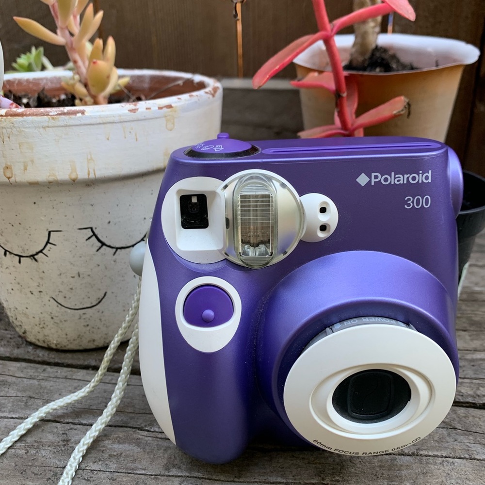 Polaroid purple camera